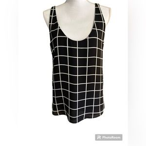 Loft black and white fully lined “silky like”tank top.  Size medium.